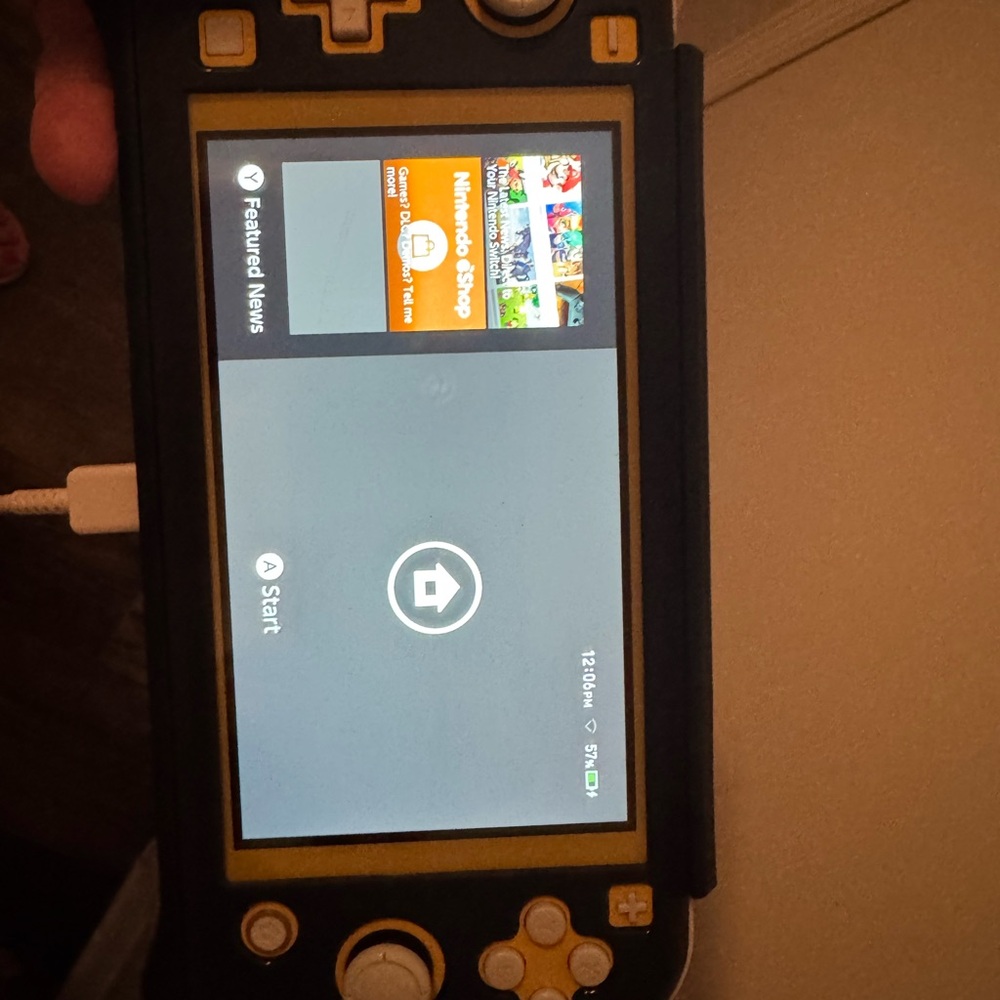Nintendo Handheld Console Black and Yellow